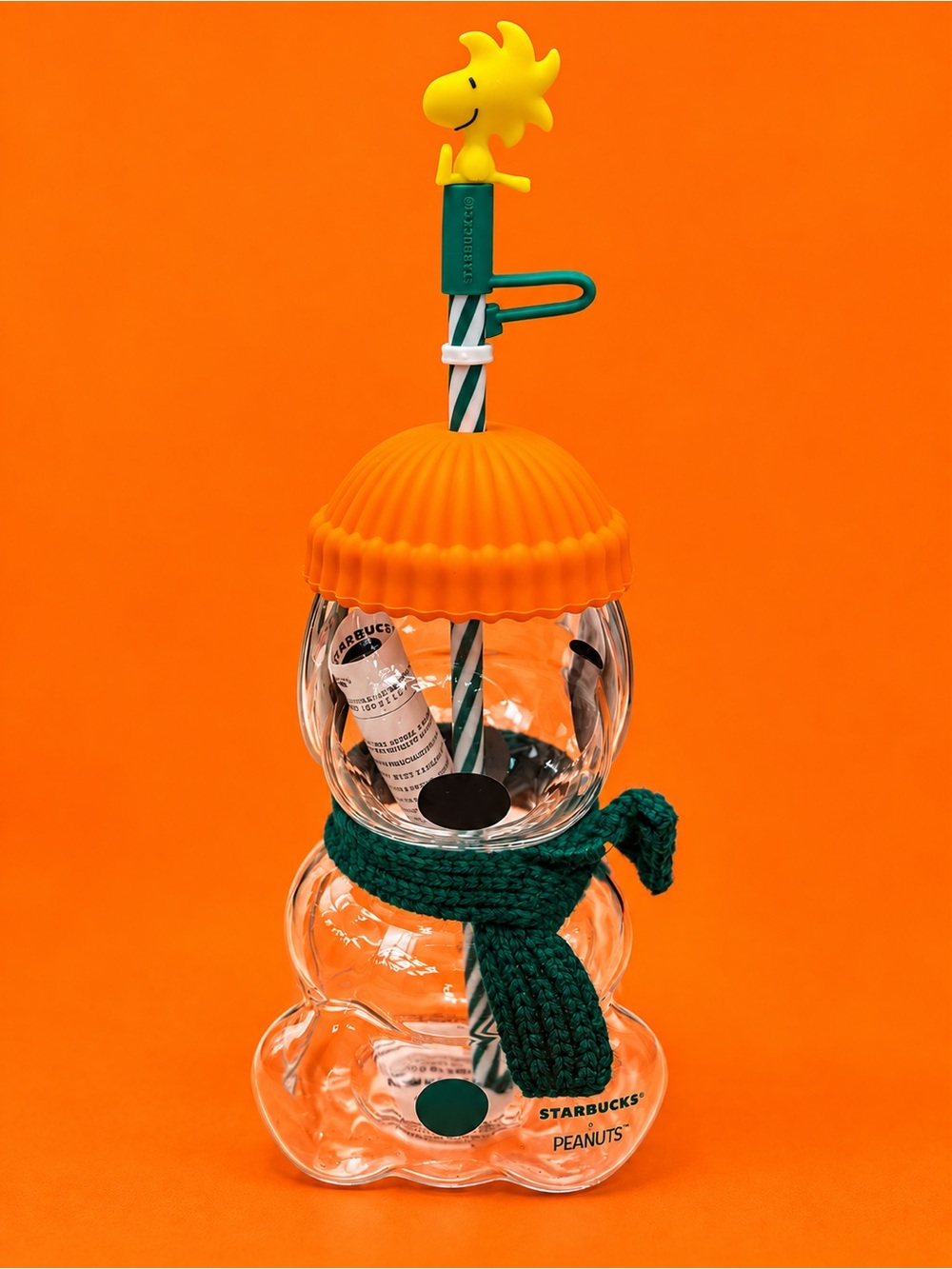 Peanuts Glass Snowman Bottle with Orange Cap and Green Scarf